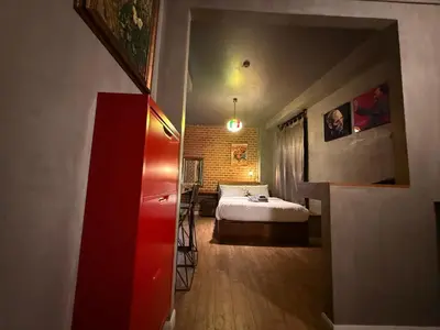 a bedroom with a bed and a red cabinet at Rent V38 #420 friendly Thailand in Bangkok