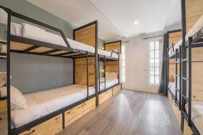 a room with four bunk beds in it at X9Hostel in Bangkok