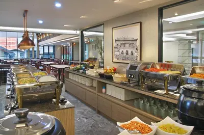 a buffet line with many different types of food at Villa Baron SHA PLUS in Nonthaburi