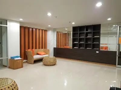 a living room with a couch and chairs in a room at Rich Park@Tao poon interchange in Bang Su