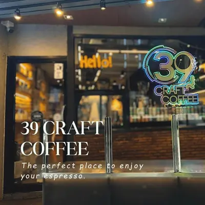 a sign in front of a coffee shop at Barn & Bed Hostel in Bangkok