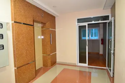 a bathroom with a shower and a glass door at The Best Place in Samutprakarn