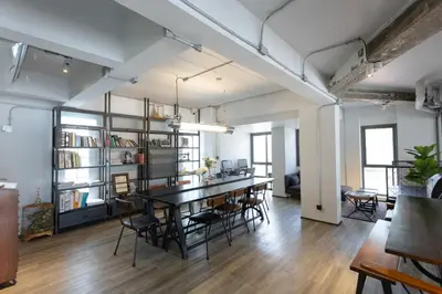 a dining room with a table and chairs at IR-ON Hotel in Bangkok