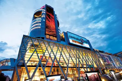 a large building with a tall building at Hoft Hostel Bangkok in Bangkok