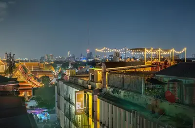 a view of a city at night with lights at RALPH Bangkok in Bangkok