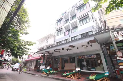 a building on the side of a street at Darin Hostel in Bangkok