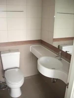 a bathroom with a toilet and a sink at Bangkok view in Pinklao in Bangkok