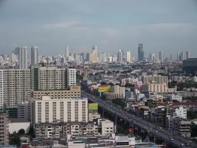 a view of a city with buildings and a freeway at Bangkok view in Pinklao in Bangkok