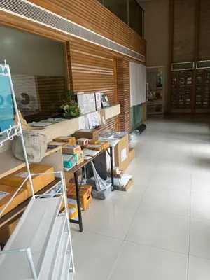 a room with a table and a room with boxes at Studio in Haven in Bangkok