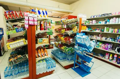 a store filled with lots of bottles of water at Grand Residence Ngamwongwan 19 in Nonthaburi