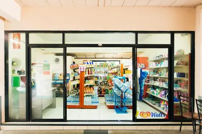 a store front window of a grocery store at Grand Residence Ngamwongwan 19 in Nonthaburi