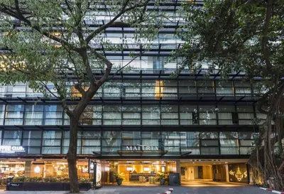 an office building with a lot of windows at Maitria Hotel Sukhumvit 18 Bangkok – A Chatrium Collection in Bangkok