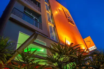 a building with a surfboard on the side of it at Hotel Solo, Sukhumvit 2, Bangkok - SHA Extra Plus in Bangkok