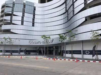 a building with a sign on the side of it at Condo Muang Thong in Nonthaburi
