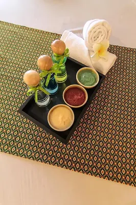 a tray with different types of food on a table at Bossotel Bangkok in Bangkok