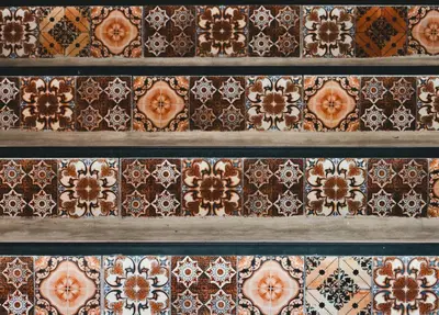 a bunch of different types of tiles on a shelf at Baansuanprannok Hotel in Bangkok
