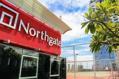 a red building with the words northwest side on it at Northgate Ratchayothin in Bangkok