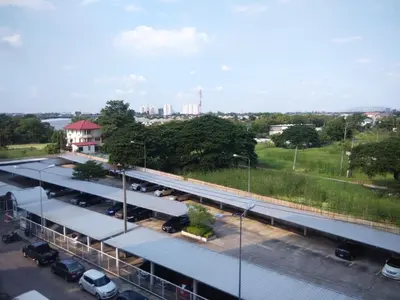 an overhead view of a parking lot with cars parked at Renovate Room Near Impact in Ban Bang Phang