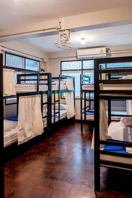 a room with a bunch of bunk beds at Dreamcatcher Bangkok in Bangkok