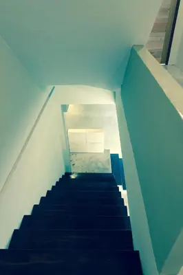 a staircase leading up to a building with a ceiling at Home'81 in Bangkok