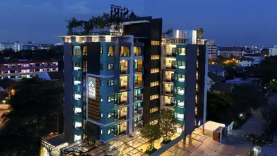 an image of a building with lights on at SiRi Ratchada Bangkok in Bangkok