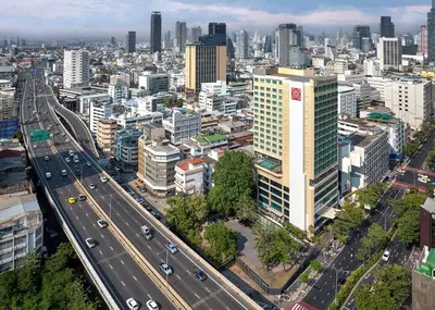 an aerial view of a city with a highway at Hilton Garden Inn Bangkok Silom in Bangkok