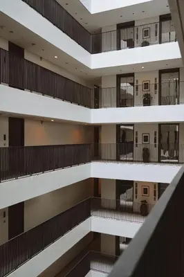 an overhead view of a building with balconies at Hansar Bangkok Hotel in Bangkok