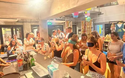 a group of people standing around a bar in a store at Lub d Bangkok Siam - New Look, Across from MBK & Skytrain Access in Bangkok