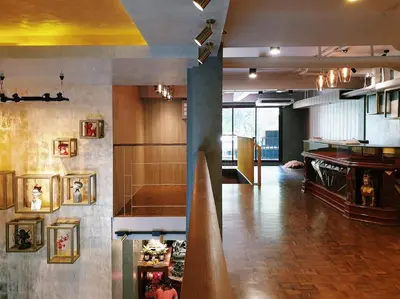 a large room with a kitchen and a living room at Golden House in Bangkok
