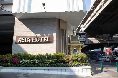 a asia hotel sign on the side of a building at Asia Hotel Bangkok in Bangkok