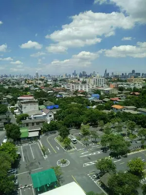 an aerial view of a city with a parking lot at The Supara in Bangkok