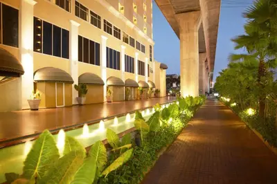 a building with a walkway in front of a building at NASA BANGKOK - Airport Rail Link Ramkhamhang in Bangkok