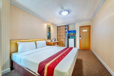 a bedroom with a large bed in a room at NASA BANGKOK - Airport Rail Link Ramkhamhang in Bangkok