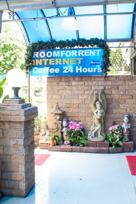 a sign for a room forent internet coffee hours at Thaiphiphat house in Bangkok