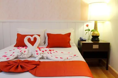 a bed with two swans made out of candy canes at Princeton Bangkok in Bangkok