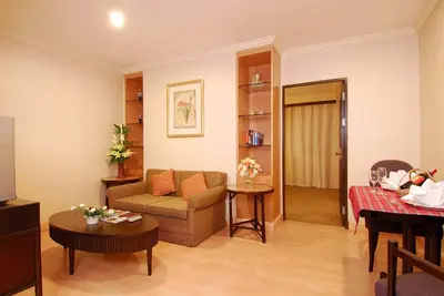 a living room with a couch and a table at Princeton Bangkok in Bangkok