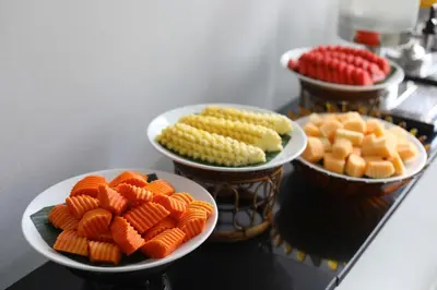 three bowls of carrots and corn on a table at Anya Nana at Sukhumvit Bangkok in Bangkok