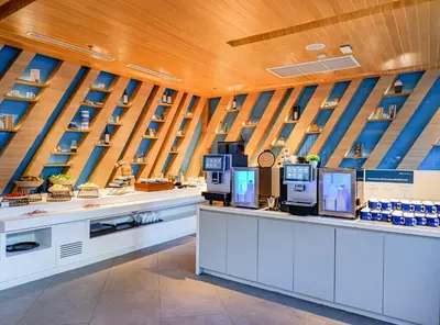 a store with three vending machines on a counter at Holiday Inn Express Bangkok Soi Soonvijai by IHG in Bangkok
