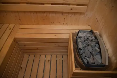 an overhead view of a sauna with a pile of rocks at V20 Boutique Jacuzzi Hotel in Bangkok