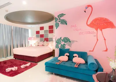 a childs bedroom with a pink flamingo wall at FuramaXclusive Asoke, Bangkok in Bangkok