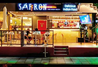people sitting at a bar in a restaurant at Citadines Sukhumvit 11 Bangkok in Bangkok