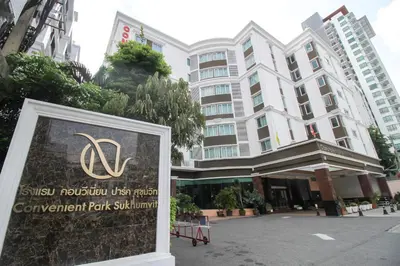 a sign in front of a building at Convenient Park Bangkok in Bangkok