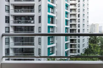 a view from a balcony of a building at Chatrium Sathon Bangkok in Bangkok