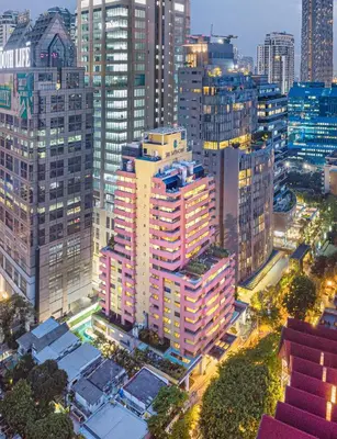 an overhead view of a city with tall buildings at The Quarter Saladaeng by UHG in Bangkok