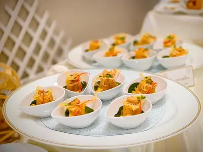 a tray of small dishes of food on a table at Metro Point Bangkok in Bangkok