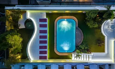 an overhead view of a house with a swimming pool at The Victory Residences Bangkok in Bangkok