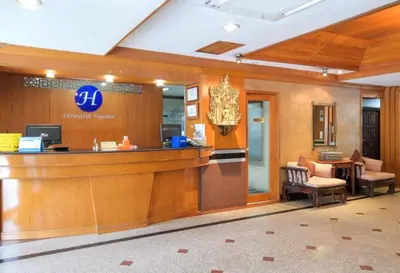 a lobby of a hospital with a reception counter at Collection O Howard Square Boutique Hotel in Bangkok