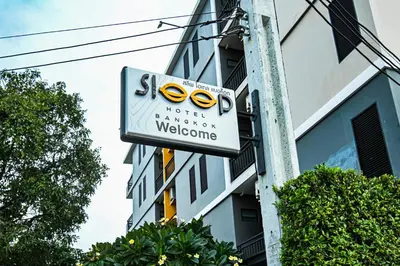 a sign for a hotel parkingatownatown welcome at Sleep Hotel Bangkok in Bangkok