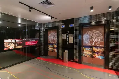 a lobby with two elevators in a building at Galleria 10 Hotel Bangkok in Bangkok