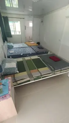 two beds sitting on a shelf in a room at PA House Apartment in Bangkok